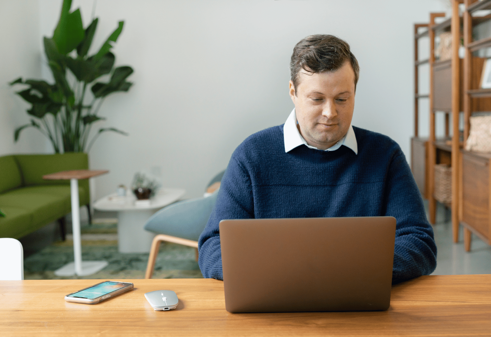 Salesperson having video call from laptop
