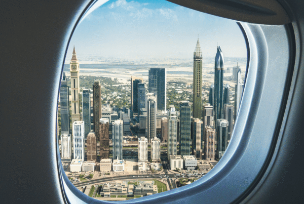 Airplane approaching Dubai skyline